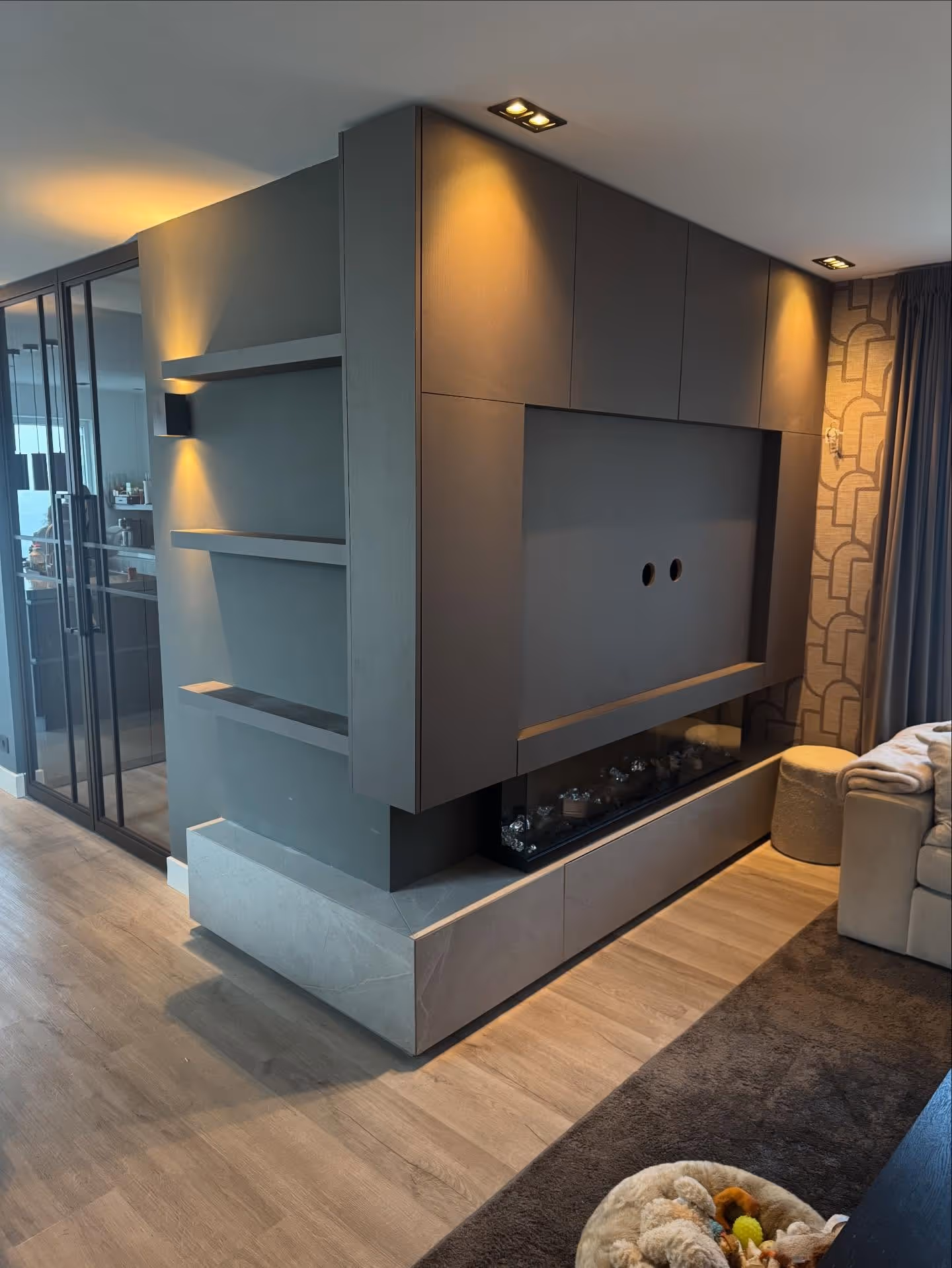 Rattan chair by a window with indoor plant